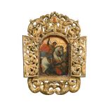 A late 18th or early 19th century Greek Orthodox Icon depicting St George and the Dragon, the arched