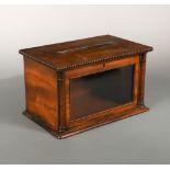 A 19th century mahogany table top post box, the beaded rectangular top with brass letter slot