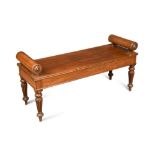 A late Regency mahogany window seat in the manner of Gillows, in gadroon moulded legs 52 x 104 x
