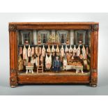 A Victorian butcher`s shop-front model diorama, the painted butcher figure standing to the centre