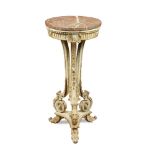 A Gris Trianon and parcel gilt gueridon, with circular rouge marble, on scroll carved feet 78 x 35cm