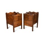 A near pair of George III mahogany night tables, each with a galleried top, crossbanded in