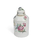 An 18th century Hochst porcelain tea caddy and cover, decorated with scattered floral sprays, the