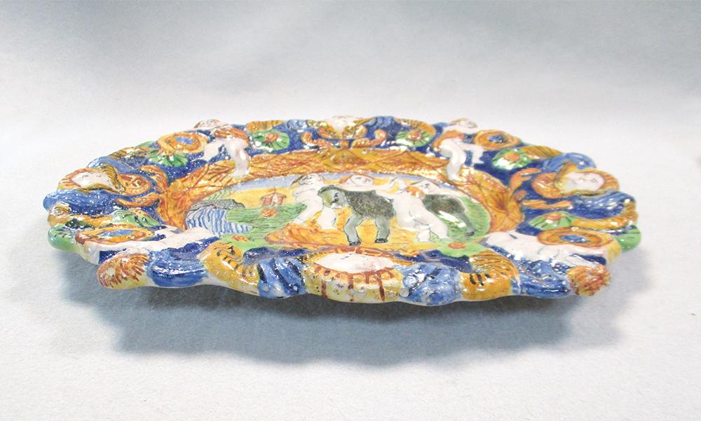 An 18th century Angarano maiolica dish, moulded and painted in green, yellow and blue with four - Image 3 of 5