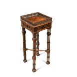 A George III Chippendale style mahogany square urn stand, 20th century, with fretwork gallery, on