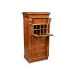 A Regency mahogany Wellington chest, with maple wood lined secretaire drawer and pigeon holes,