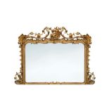 A 19th century gilt gesso framed overmantle mirror, profusely moulded with rococo scroll and