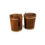 An Irish George III mahogany peat bucket and a plate bucket, brass bound with swing handles, a