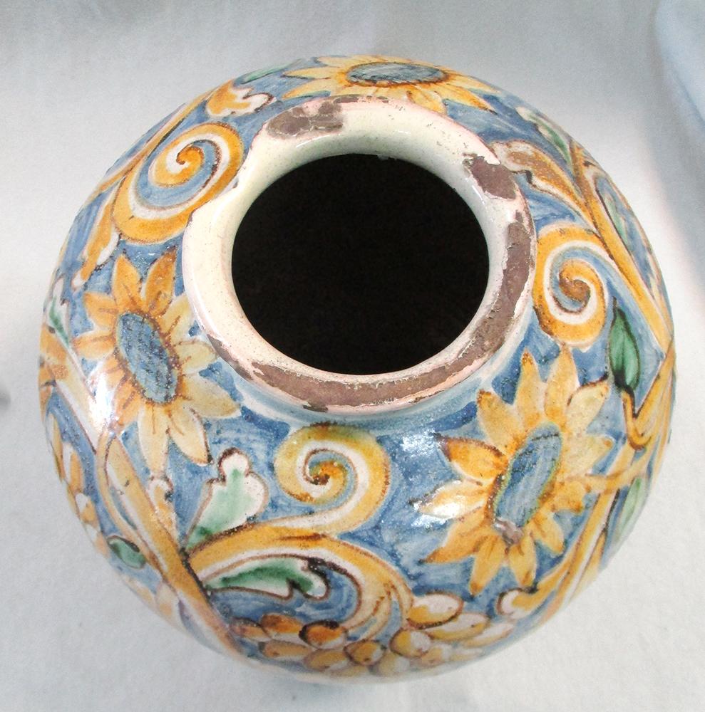 A 17th century Italian maiolica globular vase, decorated in yellow, green and blue with fruiting - Image 2 of 4