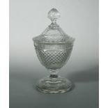 A 19th century hobnail cut glass pedestal vase and cover, probably Irish, 32cm high (2)