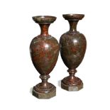 A pair of serpentinite baluster shape vases, one repaired 33.50cm (13in)