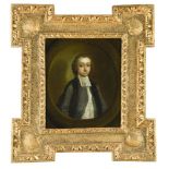 Irish School, circa 1735 Portrait of a cleric in a painted feigned oval oil on canvas, in a gilt