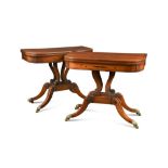 A pair of Regency mahogany and ebony inlaid card tables, crossbanded in rosewood and each with a