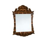 A George III oyster veneered tulipwood fret framed wall mirror, with bevelled plate, plated size,