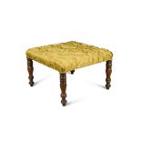 A square upholstered stool, finished in a buttoned yellow ground damask fabric, on turned legs 52