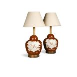 A large pair of late 20th century cinnamon glazed table lamps, decorated in relief with Botanical