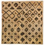 A late 19th or early 20th century Congonese rafia panel, of geometric design, mounted on a canvas