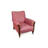 A Howard style mahogany armchair, with show wood to the arms, on square brass collared legs and