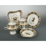 A Regency English porcelain dinner service, probably Flight and Barr, decorated with borders of