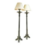 A pair of late Regency bronze Colza lamp standards, with lapit moulded decoration to the fluted