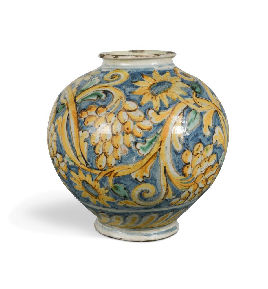 A 17th century Italian maiolica globular vase, decorated in yellow, green and blue with fruiting