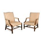 A matched pair of Gainsborough Chairs, upholstered in a pink striped fabric, (2) 94 x 72 x 72cm (