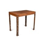 A George III ‘Chippendale’ mahogany side table, with foliate pierced angled legs, with leather