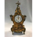 Maple & Co Paris, a French painted mantel timepiece, the waisted gilt metal mounted case with
