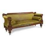 A William IV rosewood framed sofa, upholstered in a woven green fabric, with gadroon, scroll and