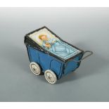 A Huntley & Palmers biscuit tin in the form of a pram, circa 1930, most likely produced by