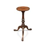 A George III mahogany tripod table, with a tray edge moulded top, on carved legs 63 x 26cm (25 x