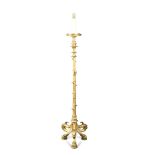 A Regency gilt bronze lamp standard, the column moulded as a bamboo cane, on a base of three