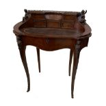 A Transitional style kingwood bureau de dame with cast metal mounts and leather inset oval writing