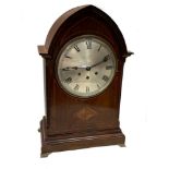An Edwardian mahogany bracket clock, with lancet arched shaped case with a three train striking
