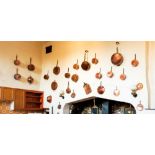 A large collection of Country House kitchen copper range pans, brassware and other related items (