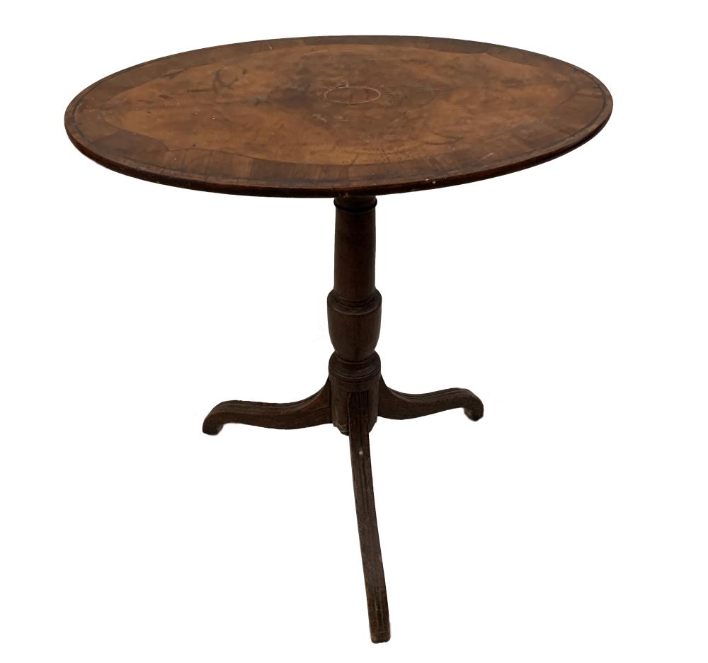 A Regency mahogany oval tripod table, crossbanded border decoration, 77 x 66cm (30 x 26in)