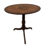 A Regency mahogany oval tripod table, crossbanded border decoration, 77 x 66cm (30 x 26in)