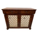 A Regency mahogany chiffonier with silk backed brass grill doors below two blind frieze drawers,