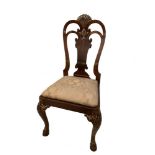 A George I style walnut and parcel gilt side chair with shell carved crest rail, 108cm (42.5in) high