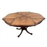 A Victorian walnut octagonal pedestal table, with radiating veneers, on a tripod base, 77cm (30in)