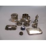 Two silver cigarette cases together with a silver mug, two mustard frames, a cigarette drum, a