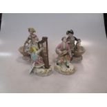 A pair of Dresden figural bonbonieres with figures sitting on baskets and two continental musical