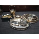 A large collection of silver plated items including entree dishes, trays, an ice bucket, vases,