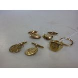 A 9ct gold signet ring and wedding band and two pairs of 9ct gold cufflinks, one pair inset with
