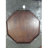 A 19th century mahogany octagonal tray with two brass handles, 55cm across the handles