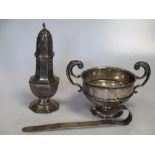 A silver two handled cup, a silver sugar caster and a silver book mark 18.4ozt gross (3)