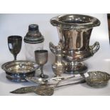 A collection of silver and plated items including a large tray, a wine cooler, bottle coaster,