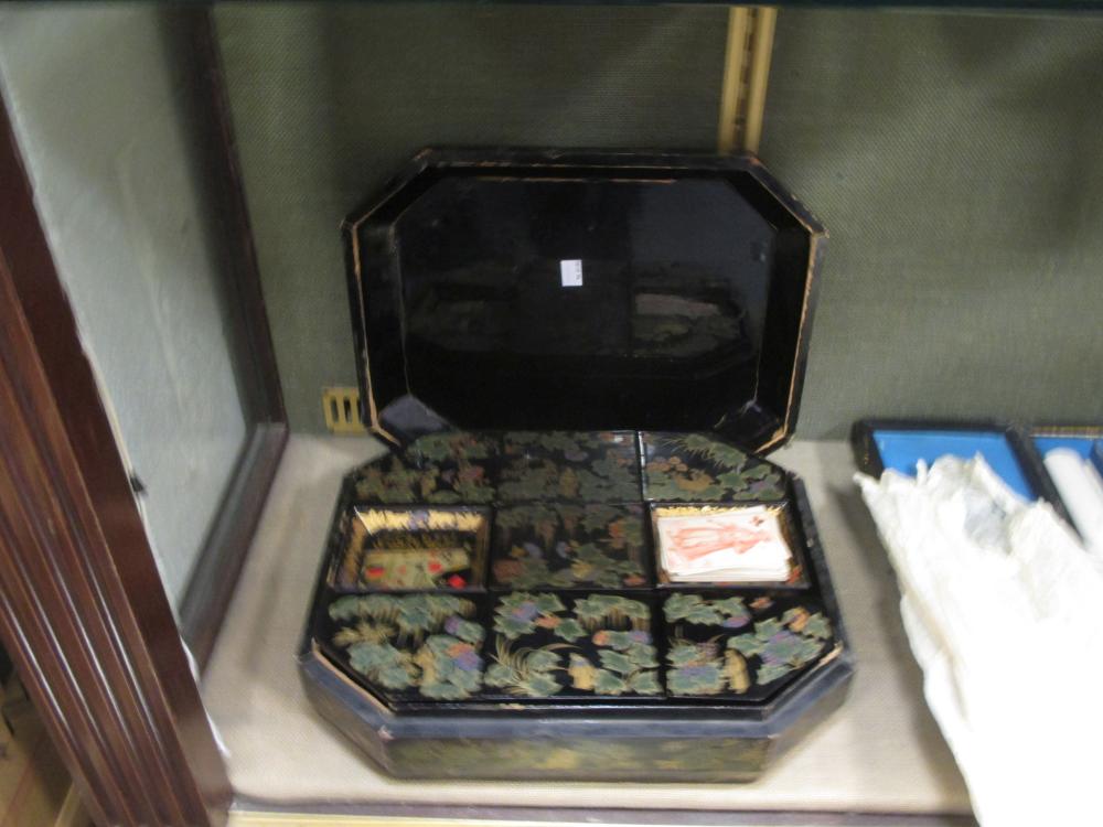 A Chinese export lacquered and gilt octagonal games box, 38cm wide, containing boxes and trays - Image 2 of 2