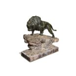 A 19th century bronze model of a lion,