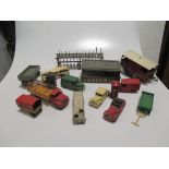 A collection of die cast Dinky cars and other items